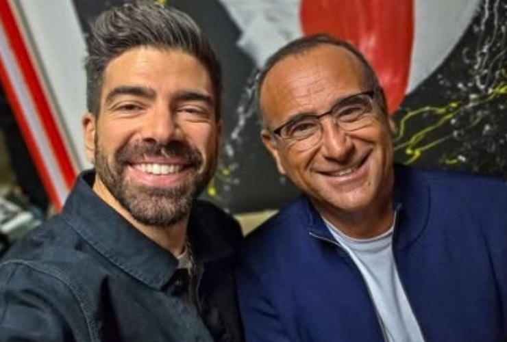 Gianluca Gazzoli e Carlo Conti sorridenti